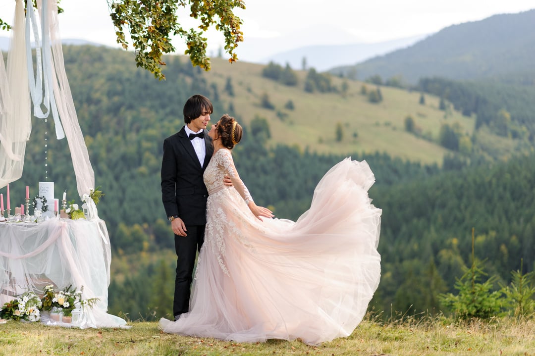 Wedding photo in the mountains. Wedding ceremony in the woods